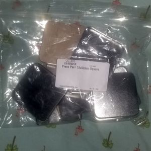 Multipack of empty makeup pans and press tools